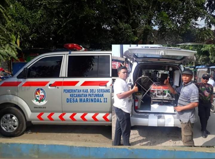 AMBULANS: Mobil ambulans yang didatangkan untuk melayani masyarakat Desa Marindal II. 
