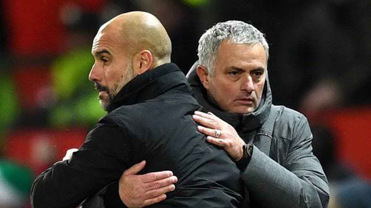 PELUK Jose Mourinho memeluk Josep Guardiola usai pertandingan.