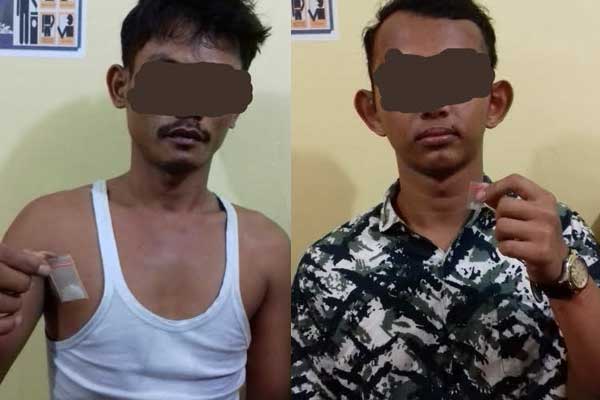 TERSANGKA: 2 tersangka masing-masing FI (19) dan Suyanto alias Tober ditangkap personel Polsek Batang Kuis.