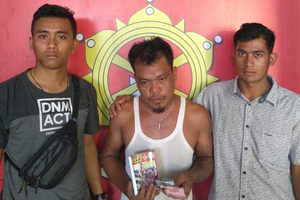 DICIDUK: AS(35) ditangkap petugas karena jurtul Togel. RUDY SITANGGANG/SUMUT POS