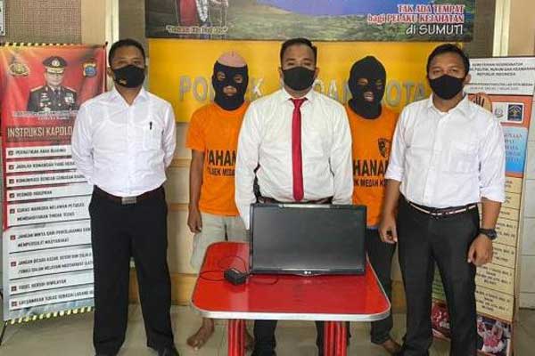 TANGKAP: Kanit Reskrim Polsek Medan Kota Iptu Ainul Yaqin (tengah) paparkan penangkapan pencuri televisi.