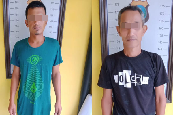 CURI: Dua tersangka mencuri buah sawit, Sakino dan Sariawan diamankan Polisi.