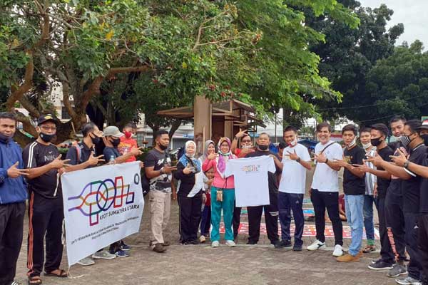 SOSIALISASI: KPOTI saat mensosialiasikan permainan dan olahraga tradisional di lapangan Merdeka Binjai, Minggu (6/9).