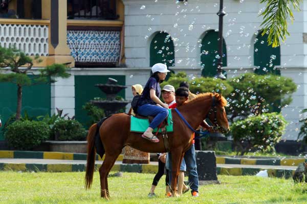 KUDA: Kuda jadi daya tarik wisatawan yang berkunjung ke Istana Maimun Medan.