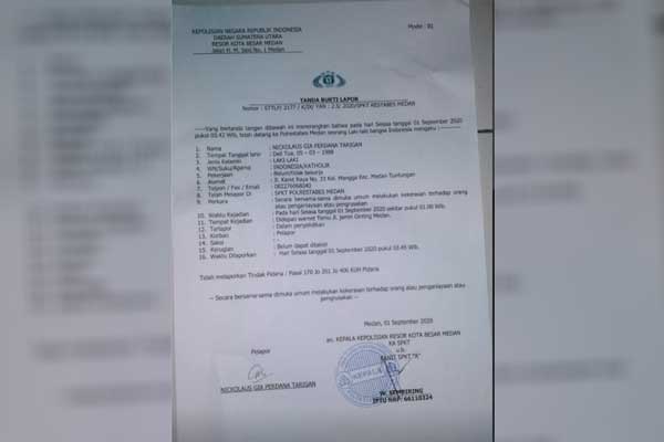 BUKTI LAPORAN: Secarik kertas laporan korban di Polrestabes Medan tentang penyerangan di warnet Jalan Jamin Ginting.