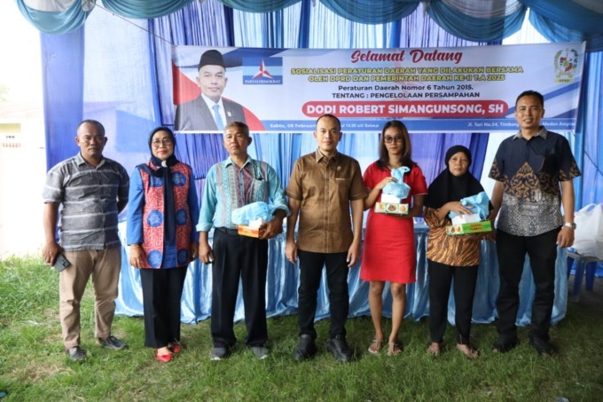 Anggota DPRD Medan dari Fraksi Partai Demokrat, Dodi Robert Simangunsong menggelar sosialisasi Perda di Jalan Turi Kelurahan Timbang Deli, Medan Amplas, Sabtu (8/2/2025). (Foto: Dokumentasi Pribadi)