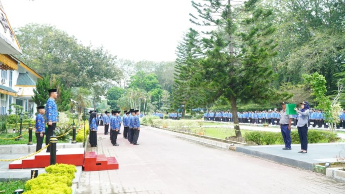 HKN: Upacara HKN dengan pembina Sekda Langkat, Amril.(Diskominfo Langkat/Sumut Pos)