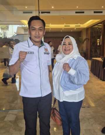 Ketua ASKI Sumut Hj Rosdiana bersama Ketua Umum KONI Kota Medan Aswindy Fachrizal SE. (Dok Pribadi)