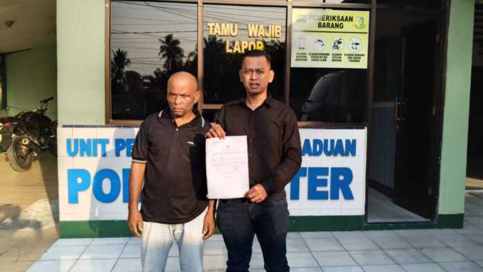 LAPORAN: Korban didampingi kuasa hukum membuat laporan ke Sub Den POM Tebingtinggi, Rabu (11/2).