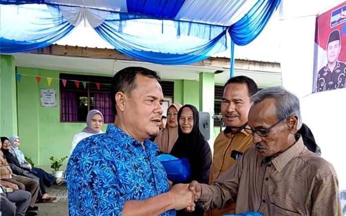 PKH Medan Makmur SOSIALISASI: Muslim saat menggelar Sosialisasi Perda Kota Medan Nomor 5 Tahun 2015 tentang Penanggulangan Kemiskinan di Medan Labuhan, Minggu (10/5/2026).