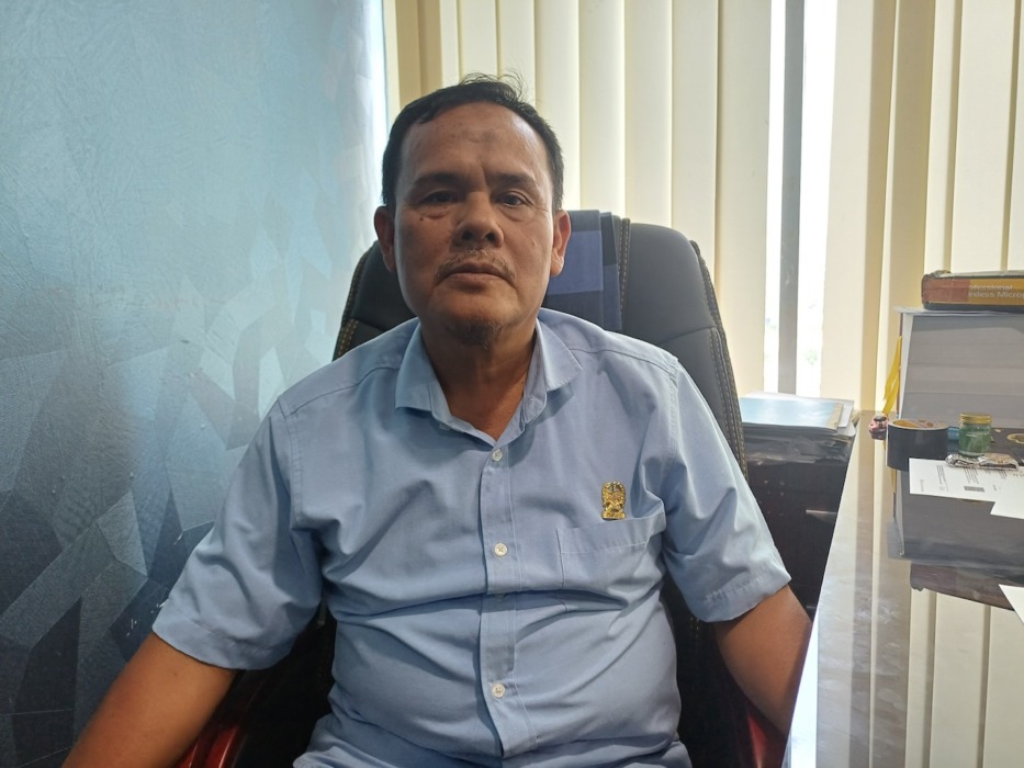 Dr H Muslim Harahap.