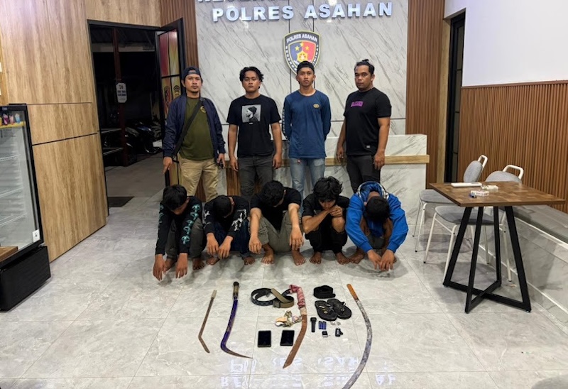 AMANKAN TAWURAN: Polres Asahan saat mengamankan terduga pelaku tawuran, di Jalan Sisingamangaraja, Asahan. (Istimewa/Sumut Pos)