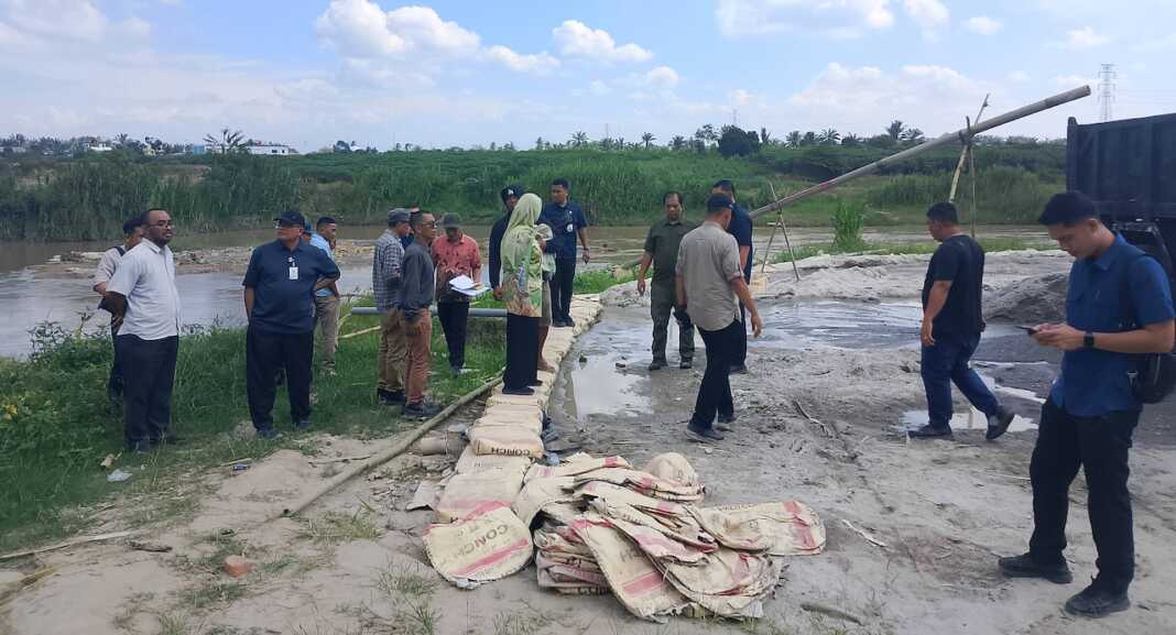 TANPA IZIN: Penertiban pertambangan tanpa izin (Peti) di aliran Sungai Ular, Kecamatan Perbaungan, Kabupaten Serdang Bedagai (Sergai), Jumat (26/6/2026). (Dok : Ihsan Syahreza)