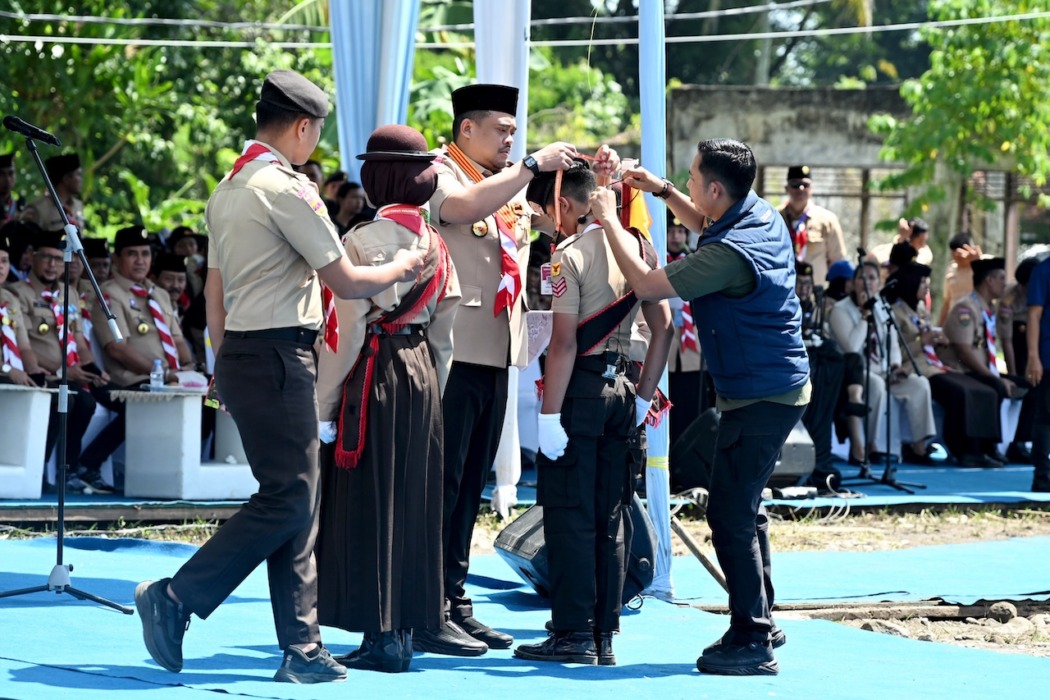 TUTUP: Gubsu Muhammad Bobby Afif Nasution menutup secara resmi Jambore Daerah XI di lapangan bumi perkemahan Sibolangit, Kabupaten Deliserdang, Minggu (12/7/2026).(Diskominfo Sumut)