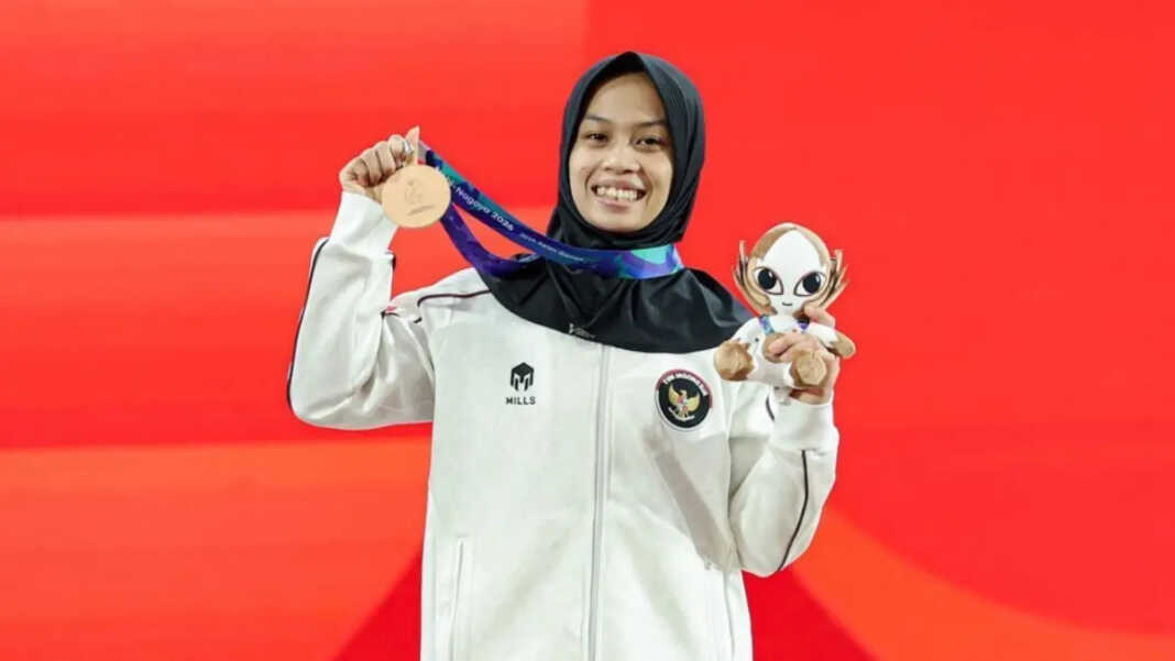 PERUNGGU: Luluk Diana Tri Wijayana meraih medali perunggu di Asian Games 2026. (int).