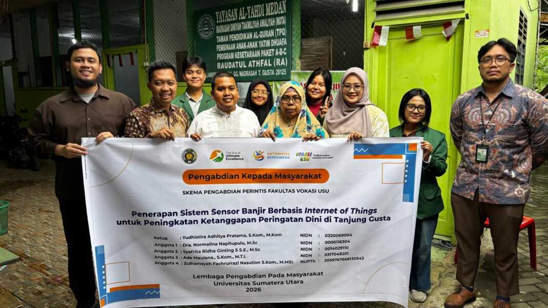 Tim Pengandian kepada Masyarakat Fakultas Vokasi USU foto bersama Pengurus Yayasan Al-Yabdi Medan di sela kegiatan. (Foto: Istimewa)