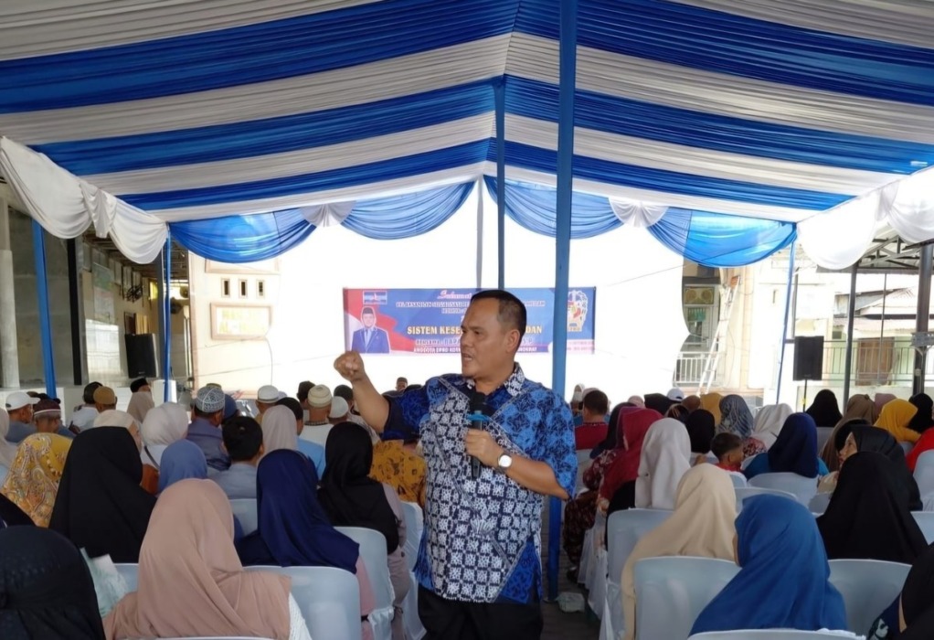 SOSIALISASI: Anggota DPRD Medan Fraksi Demokrat, Muslim Harahap menggelar Sosialisasi Perda di Medan Labuhan, Minggu (11/10/2026).