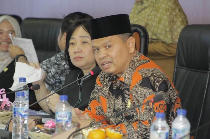 H Kasman Lubis.
